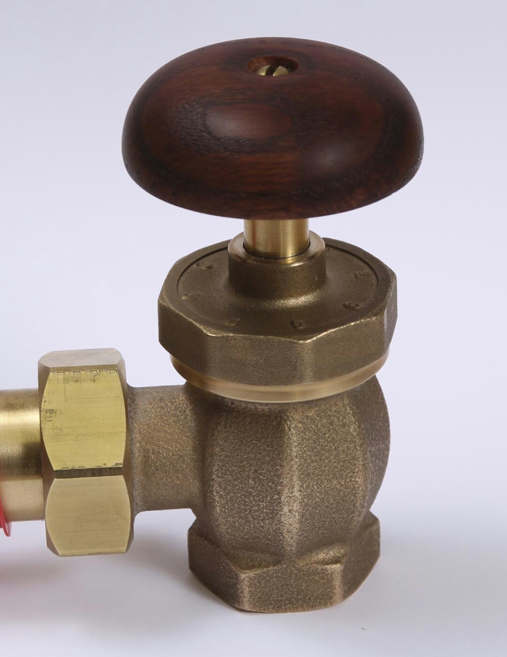 Wooden Handle Radiator Valves with a plain finish.