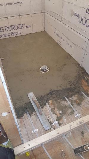 Under pan mud being installed